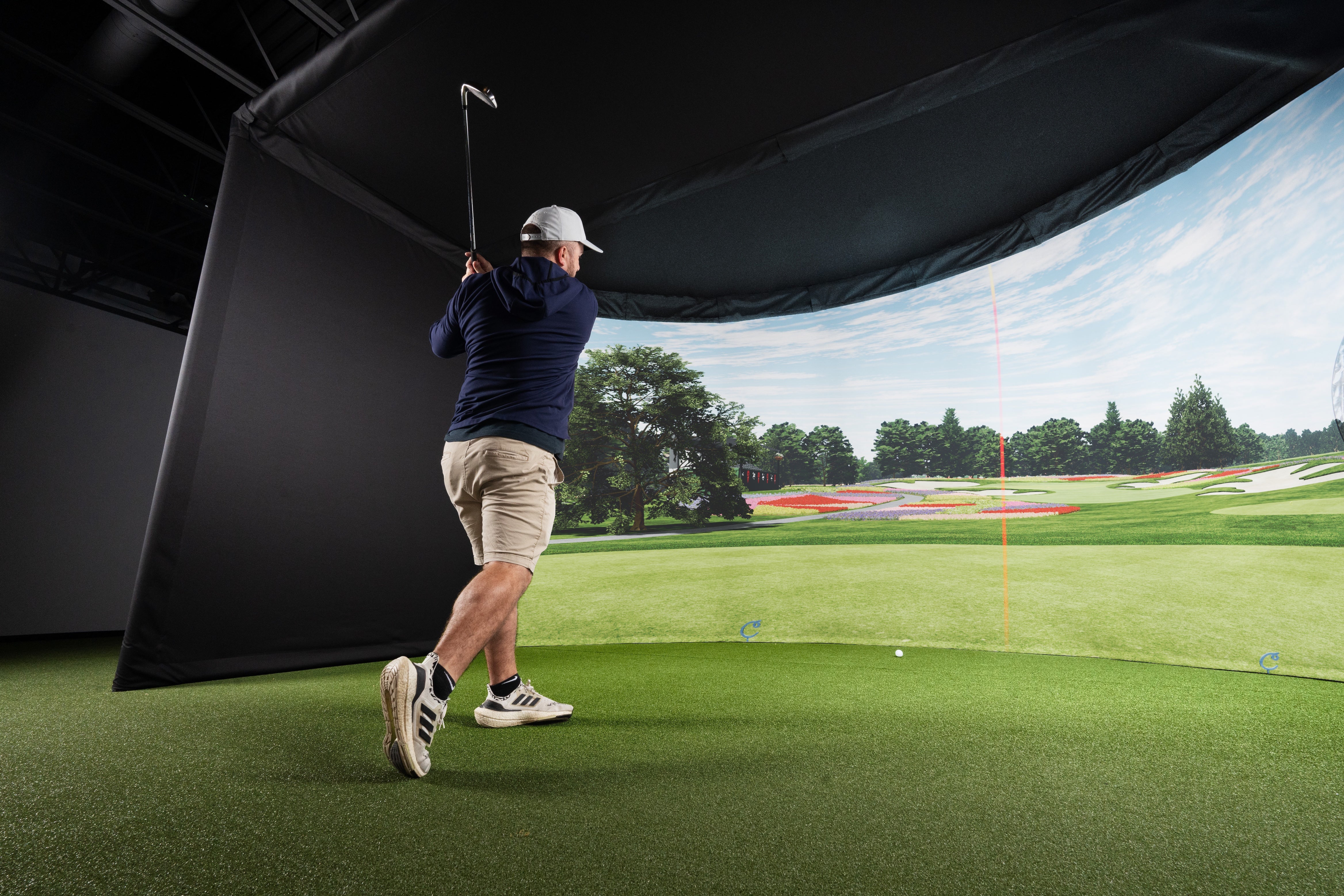 Curved Golf Simulator Enclosure